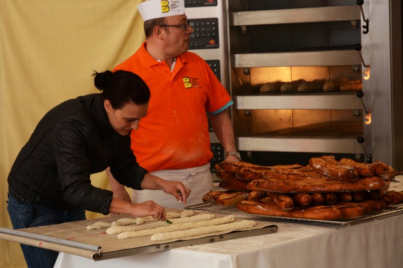 lafetedupainfestivalofbreadinabigtentinfrontofnotredamealessoninbaguettemaking.jpg